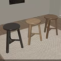 Three Stools Black Light Wood Dark Wood On Woven Rug With Wooden Floor And Window