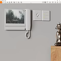Modern Wall Mounted Doorbell with Screen Displaying Breathe Text Near Light Switches and Decorative Figurine