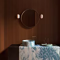 Modern Bathroom Washbasin With Circular Mirror Wooden Wall And Marble Countertop Toiletries