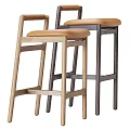 Two Modern Bar Stools With Wooden Frames Brown Leather Seats And Sturdy Design