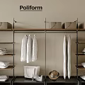 Modern Poliform Shelving Unit With Hanging Clothes Folded Linens And Storage Baskets