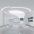 Modern Tech Exhibition Hall With Circular Ceiling Lamp Digital Screens And Curved White Reception Desk