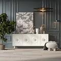 White TV Stand With Circular Accents Against Dark Blue Wall Decorative Painting And Green Plant