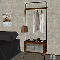 Modern Clothes Rack in Bedroom Setting with Hanging Apparel Leather Bag and Wheeled Wooden Cabinet