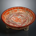 Hand Carved Tripod Plate With Orange Red Decorative Patterns And Intricate Sculpted Details