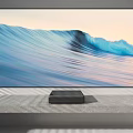 Sleek Modern Television With Blue Wave Mountain Scene On Concrete Stand
