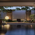 Modern Courtyard Garden Design With Outdoor Seating Green Plants And Ambient Lighting