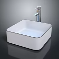 White Square Ceramic Sink With Modern Silver Faucet On Black Background