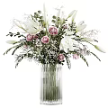 Clear Glass Vase With White Lilies Pink Roses Green Leaves And Small White Flowers
