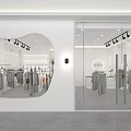 Modern Clothing Store Interior Featuring Trendy Clothes On Racks And Minimalist Design