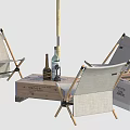 Outdoor Table Setup With Folding Chairs Orange Umbrella And Wooden Crate