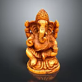 Wooden Elephant Statue Sitting With Decorative Headpiece And Detailed Carvings Against Dark Background
