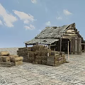 Old Wooden House With Hay Bales Crates Stone Paved Ground And Blue Sky Clouds