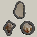 Three Irregular Shaped Silver Framed Mirrors Hanging On Light Wall Reflecting Room Details