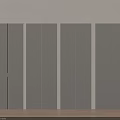 Grey Wardrobe Doors Arranged Side by Side Against White Wall With Wooden Floor