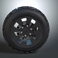 Rugged Off Road Tire With Black Wheel Rim Multiple Holes And Deep Tread Pattern