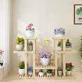 Decorative Multi tier Wooden Plant Shelf With Colorful Potted Flowers And Green Plants