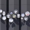 Artistic Decorative Plates With Diverse Designs Arranged On Dark Wall For Home Decoration
