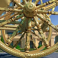 Antique Ornate Carriage With Gold Accents Red Black Design And Large Wheels