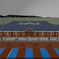 Red Guesthouse Building with Black Roof Wooden Boardwalk Blue Pools Surrounding Trees and Distant Mountains