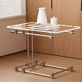 Modern Side Table with Transparent Glass Top Metal Frame and Casters in Living Room