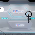Modern Public Office Space With Broadcast Desk HNlive Logo Hexagonal Backdrop And Professional Lighting
