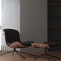 Modern Leisure Chair with Black Cushion Wooden Base and Matching Ottoman in Minimalist Interior