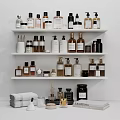 Household Essentials Display on Organized Shelves with Various Bottles Jars Towels and Candles