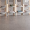 Row of Modern Washbasins With Round Mirrors And Colorful Styles In Bright Lighting