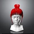 White Mannequin Head Featuring Red Bun Hairstyle With Front Bangs And Side Tresses