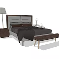 Double Bed with Dark Bedding Upholstered Headboard Floor Lamp Side Tables and Bed Bench