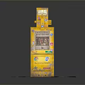 Yellow Gum Ball Vending Machine With Colorful Stickers And Buttons On Brown Mat