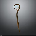 Artistic Curved Wooden Weapon with Long Pole and Blue Glowing Circular Top
