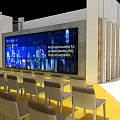 Modern Lounge Area Interior With Comfortable Seats And Large Digital Screen