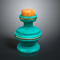 A Woman Holding Turquoise Decorative Bottle With Wooden Cork And Gold Accents