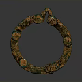 Ancient Circular Metal Sculpture With Intricate Patterns And Patinated Green Orange Hues