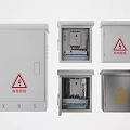 Different Electrical Distribution Boxes With Warning Signs And Internal Components