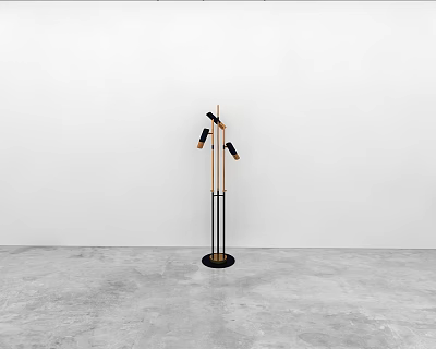 Sleek Gold And Black Floor Lamp With Three Lamp Heads Against White Wall Gray Floor 3d model