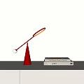 Red Table Lamp With Cone Base Modern Design And Books On White Surface 3d model