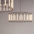 Elegant Modern Circular Chandeliers Featuring Slim Tube Lights In Interior Design