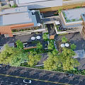 Modern Commercial Street With Modern Buildings Greenery And Outdoor Seating Areas