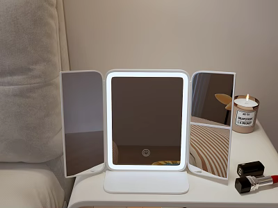 Lighted Tri fold Vanity Mirror With Candle And Lipstick On Table 3d model