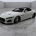 White Convertible Sports Car With Sleek Design Black Soft Top And Alloy Wheels