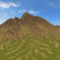 Scenic Mountain Landscape With Brown Textured Peak Green Grassy Fields And Blue Sky White Clouds