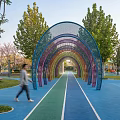 School Square With Green Lawns Colorful Paths Trees And Seating Areas