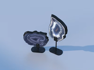 Elegant Agate Slice Decorative Pieces on Black Stands with Light Blue Background 3d model