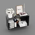 Decorative Ornament Set On Black Shelf Featuring White Flowers Photo Frame Candles Books And Magazines