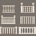 White Decorative Railings with Various Designs and Ornate Architectural Details