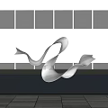 Sleek Metallic Sculpture With Flowing Curved Design In Indoor Lobby With Water Pool Reflection
