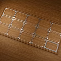 Brown Rectangular Carved Mat with Silver Edge Patterns on Wooden Floor Square Grid Sections 3d model